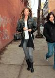 Gisele Bundchen in black leather jacket