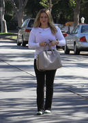 http://img176.imagevenue.com/loc534/th_312192653_Hilary_Duff_Out_to_vote17_122_534lo.jpg